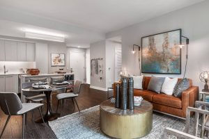 Bright, spacious open-concept floor plans with pendant lighting and hardwood flooring throughout